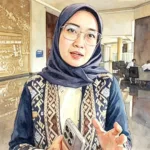 Foto olah digital Direktur Ekosistem Media Kementerian Komunikasi dan Digital (Komdigi), Farida Dewi Maharani.